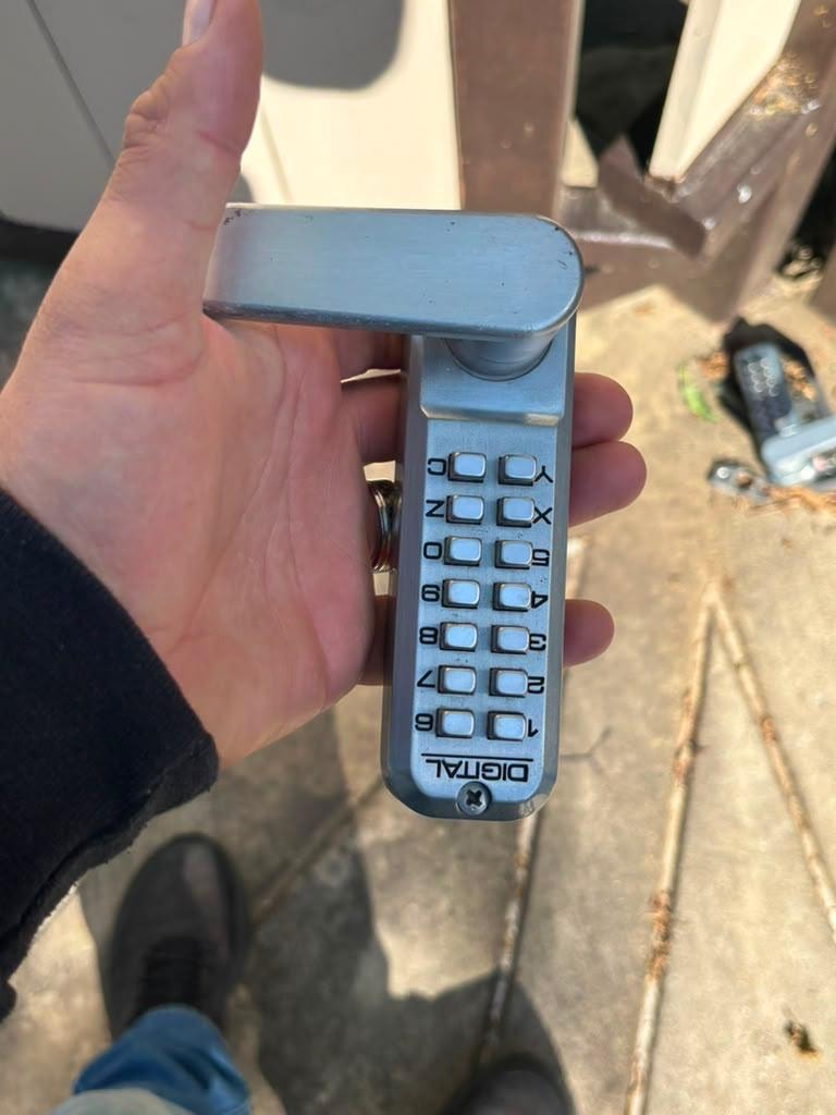 Mechanical keypad handle lock supplied and installed.