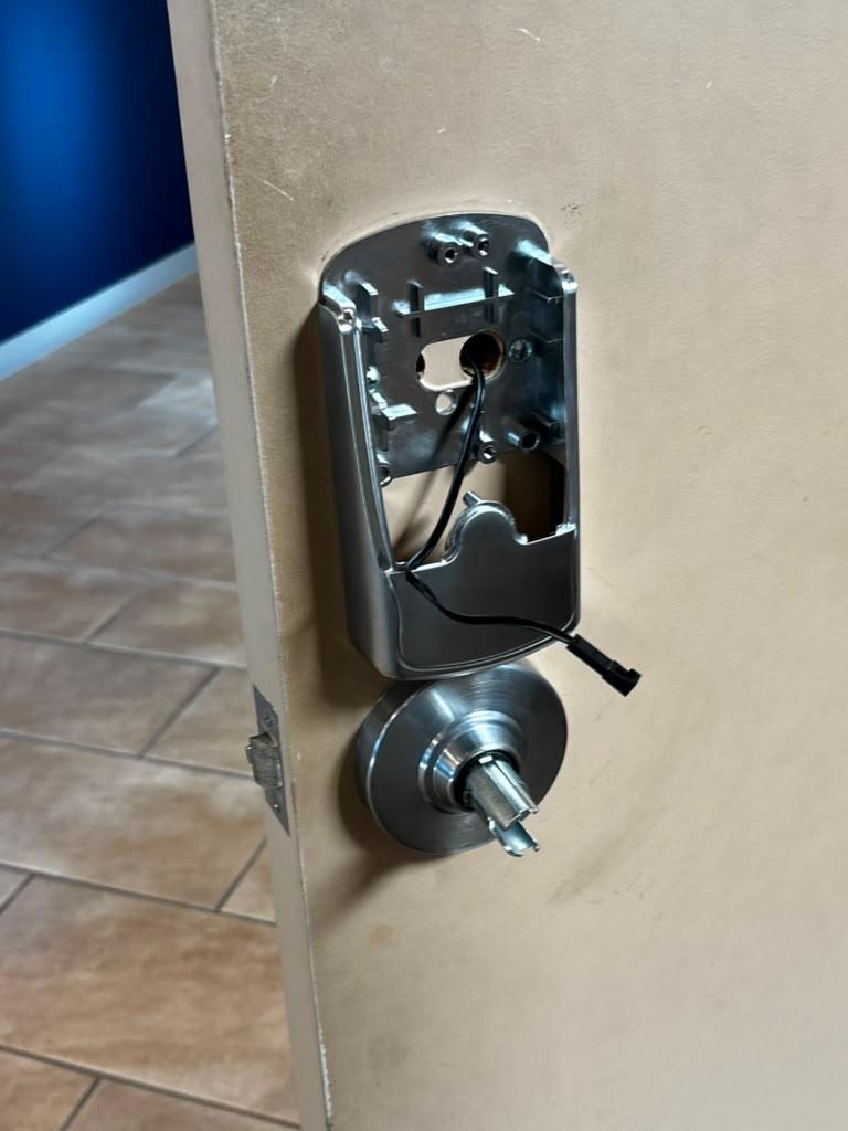 Smart lock wiring and mounting during installation.