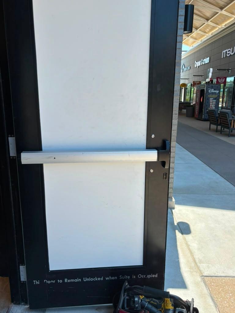 Commercial panic-bar and exit-door hardware.